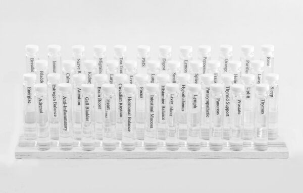 A collection of labeled Test Vials™ neatly organized in a rack, suggesting a scientific or medical analysis setting.